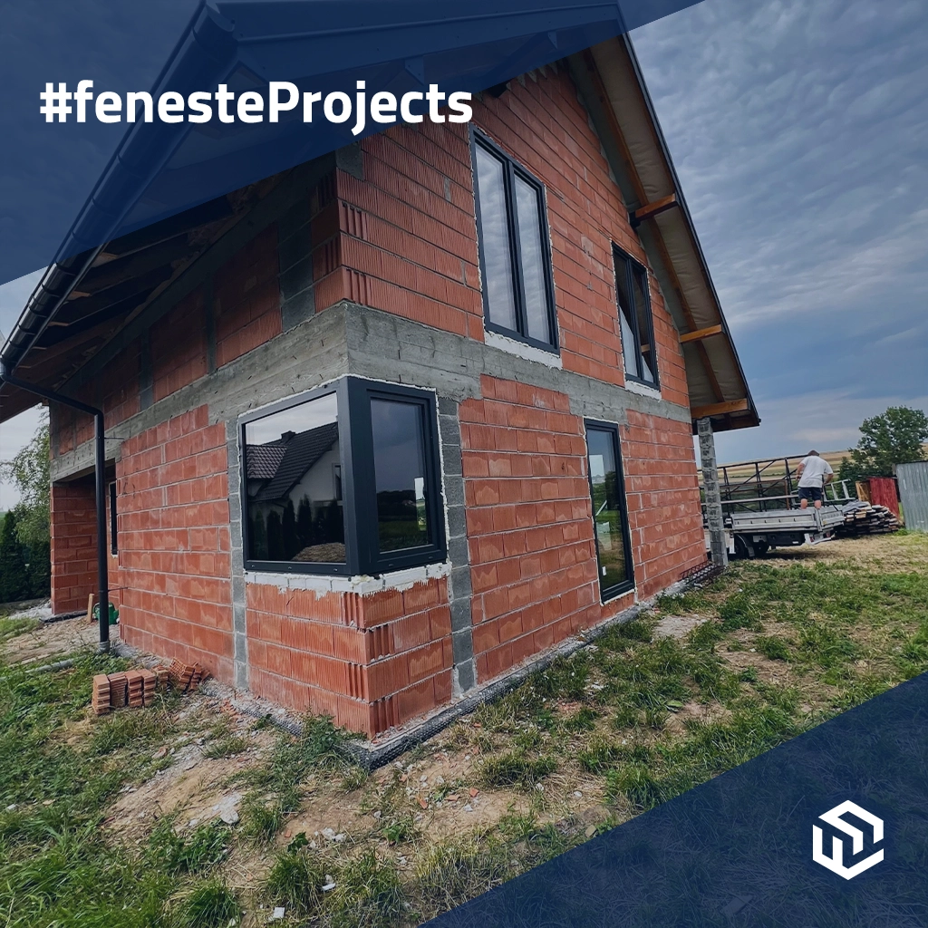 Single-family house with black windows on the outskirts of the city projects window-profiles pvc rehau  